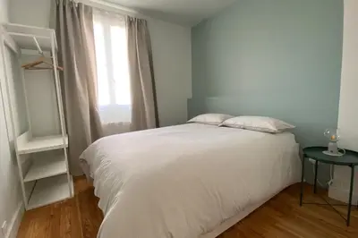 Un ou plusieurs lits dans un hébergement de l'établissement Apart'Champagne Les Deux Ponts station & center