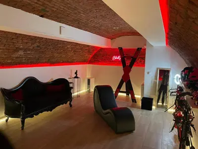 Coin salon dans l'établissement Suite de Luxe - Jacuzzi & Cave Secrète