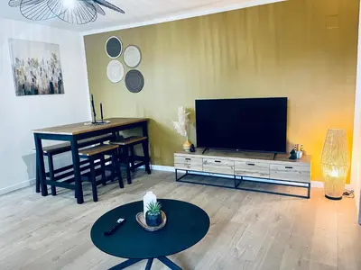 Télévision ou salle de divertissement dans l'établissement Le Pattulacci