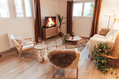 Coin salon dans l'établissement Appartement haut de gamme - Epernay Centre - 3 étoiles