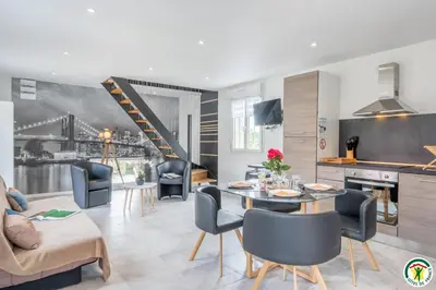 Coin salon dans l'établissement Le gite des ecuries de marquecy