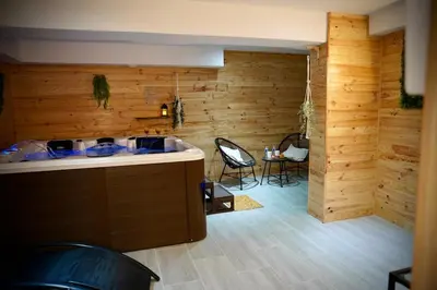 Coin salon dans l'établissement Suite, Hammam, Sauna, et Jacuzzi