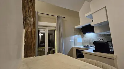 Cuisine ou kitchenette dans l'établissement La Suite Orme