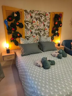 Un ou plusieurs lits dans un hébergement de l'établissement Une virée à deux, gîte et spa