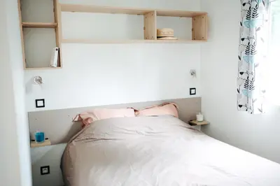 Un ou plusieurs lits dans un hébergement de l'établissement Mobil Home XXL 4 chambres - Camping Country Park