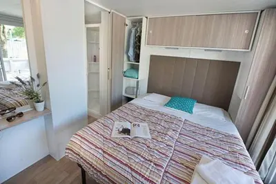 Un ou plusieurs lits dans un hébergement de l'établissement Camping Le Chêne Gris