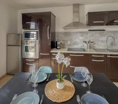 Cuisine ou kitchenette dans l'établissement Le Margnotin