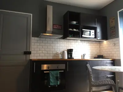 Cuisine ou kitchenette dans l'établissement Résidence Molière M4
