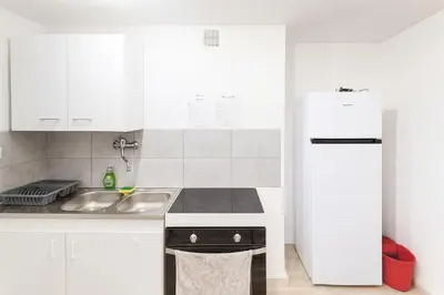 Cuisine ou kitchenette dans l'établissement Séjourner chez Roto