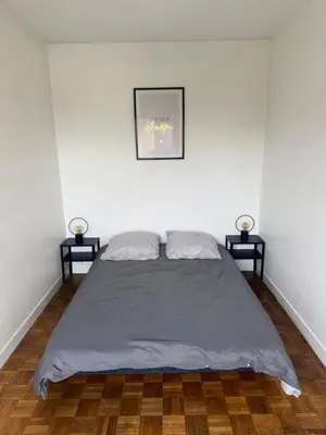 Un ou plusieurs lits dans un hébergement de l'établissement Appartement Châlons en champagne
