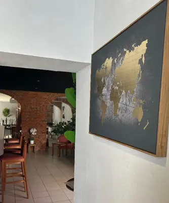 Coin salon dans l'établissement Hôtel les Paturelles