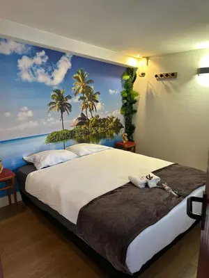Un ou plusieurs lits dans un hébergement de l'établissement Hôtel les Paturelles