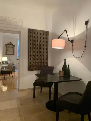 Coin salon dans l'établissement La Suite Carmen - Hypercentre de Reims