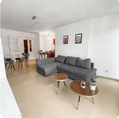 Coin salon dans l'établissement Appartement en duplex, proche du centre ville, parking privé