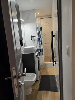 Salle de bains dans l'établissement Hamdan Suite