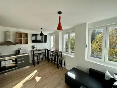 Cuisine ou kitchenette dans l'établissement Petra - Le confort à portée de main
