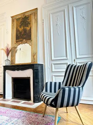 Coin salon dans l'établissement Libergier superbe T2 à côté de la cathédrale