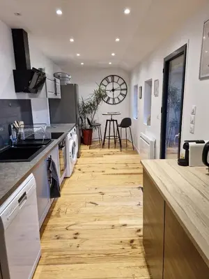 Cuisine ou kitchenette dans l'établissement La grange de l'Ailette