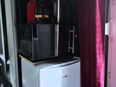 Cuisine ou kitchenette dans l'établissement Love Room intime - Sauna infrarouge - Hmm OH Oui