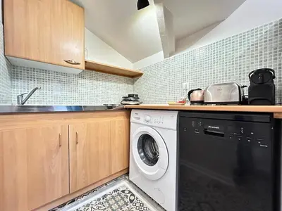 Cuisine ou kitchenette dans l'établissement Delacroix magnifique T2 au centre