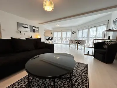 Coin salon dans l'établissement E Mercier magnifique grand T2 à deux pas du centre