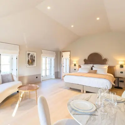 Un ou plusieurs lits dans un hébergement de l'établissement Les Suites BB, Champagne Besserat de Bellefon