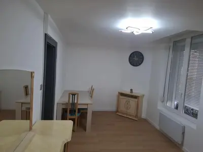 Coin salon dans l'établissement Appartement cosy