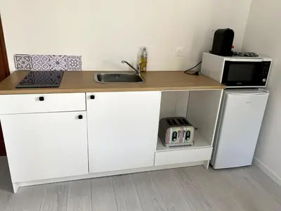 Cuisine ou kitchenette dans l'établissement Jolie duplex avec vue sur forêt