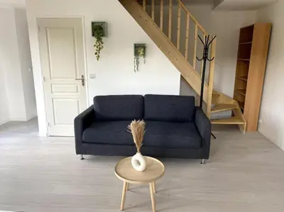 Coin salon dans l'établissement Jolie duplex avec vue sur forêt