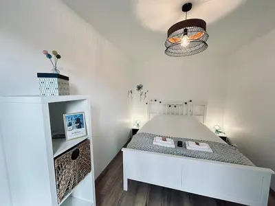 Un ou plusieurs lits dans un hébergement de l'établissement La maison des vignes 3chambres jardin proche Reims