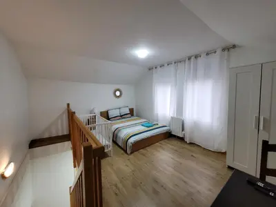 Un ou plusieurs lits dans un hébergement de l'établissement Duplex apartment 700 m from Compiègne train station