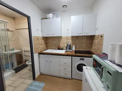 Cuisine ou kitchenette dans l'établissement Duplex apartment 700 m from Compiègne train station