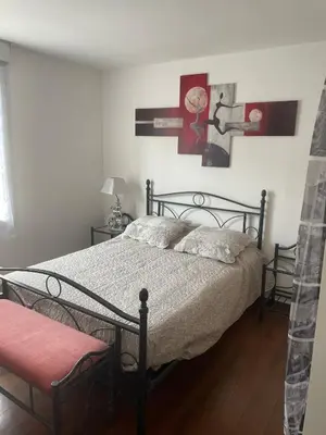 Un ou plusieurs lits dans un hébergement de l'établissement Maison agréable de 51 m2