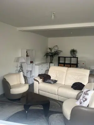 Coin salon dans l'établissement Maison agréable de 51 m2
