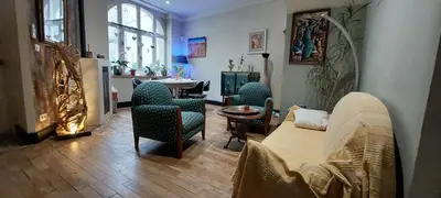 Télévision ou salle de divertissement dans l'établissement Regard d'O