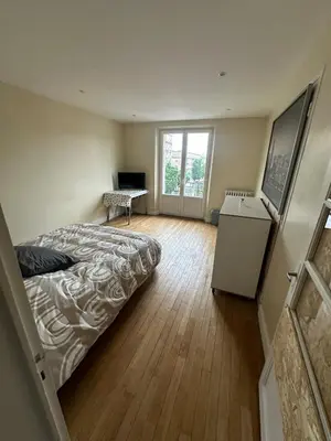 Un ou plusieurs lits dans un hébergement de l'établissement Appartement place Nevers