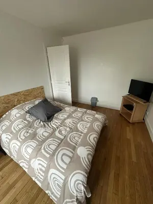 Un ou plusieurs lits dans un hébergement de l'établissement Appartement place Nevers
