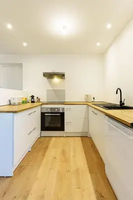 Cuisine ou kitchenette dans l'établissement Impasse verte