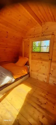 Un ou plusieurs lits dans un hébergement de l'établissement La cabane