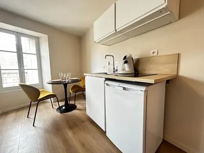 Cuisine ou kitchenette dans l'établissement E5 Reton T2 chic et confortable au coeur d Epernay