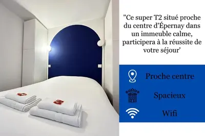 Un ou plusieurs lits dans un hébergement de l'établissement E5 Reton T2 chic et confortable au coeur d Epernay