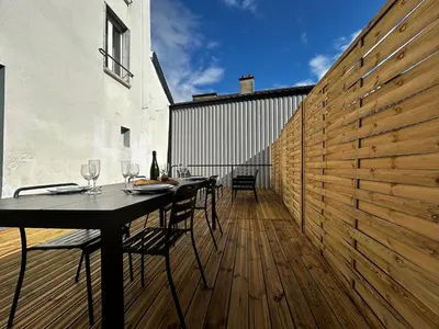 Balcon ou terrasse dans l'établissement E1 Reton magnifique T3 RDC terrasse et jacuzzi