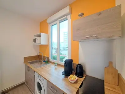 Cuisine ou kitchenette dans l'établissement El Dorado - Proche du centre-ville