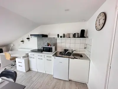 Cuisine ou kitchenette dans l'établissement Le pilier G un cocon confortable proche du centre