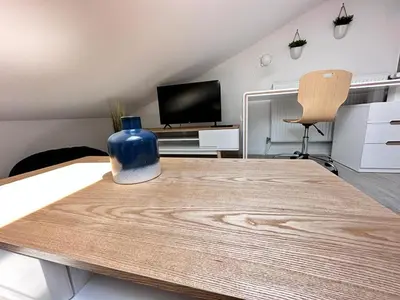 Télévision ou salle de divertissement dans l'établissement Le pilier G un cocon confortable proche du centre