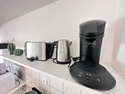 Cuisine ou kitchenette dans l'établissement Le pilier G un cocon confortable proche du centre