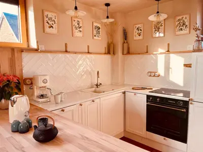 Cuisine ou kitchenette dans l'établissement Évasion nature et bien-être - SPA - Petit Déjeuner