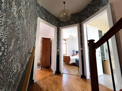 Un ou plusieurs lits dans un hébergement de l'établissement Maison meulière du 34e Sacre, à proximité du Domaine Pommery