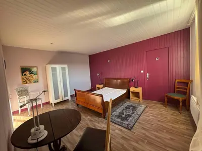 Un ou plusieurs lits dans un hébergement de l'établissement Loft entre vignes et lac