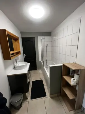 Cuisine ou kitchenette dans l'établissement Appartement avec terrasse